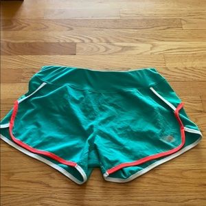 Teal North Face running shorts